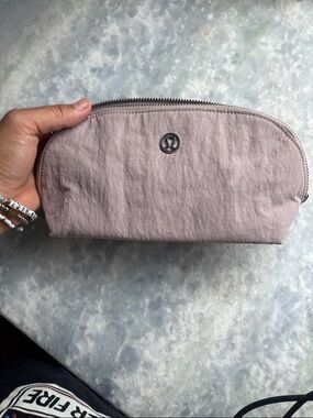 lululemon lavender/dusty pink zip pouch with silver logo